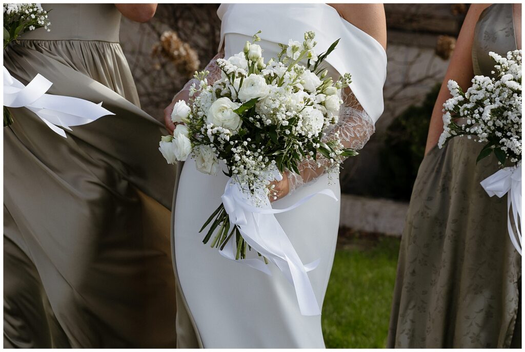 Wedding bouquet ribbon blowing in the wind