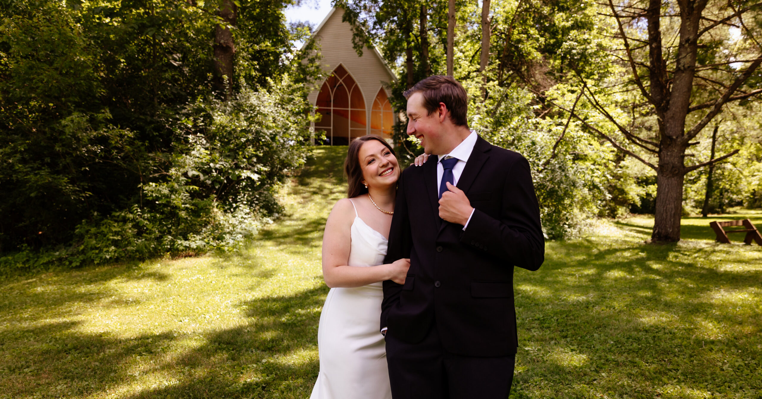 Bride and Groom Portraits with open air chapel at Winnebago Spring